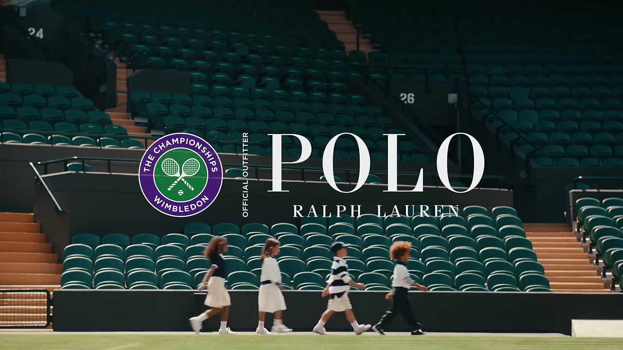 Frame from the opening beat: children walking across the Wimbledon court behind Polo Ralph Lauren brand supers.